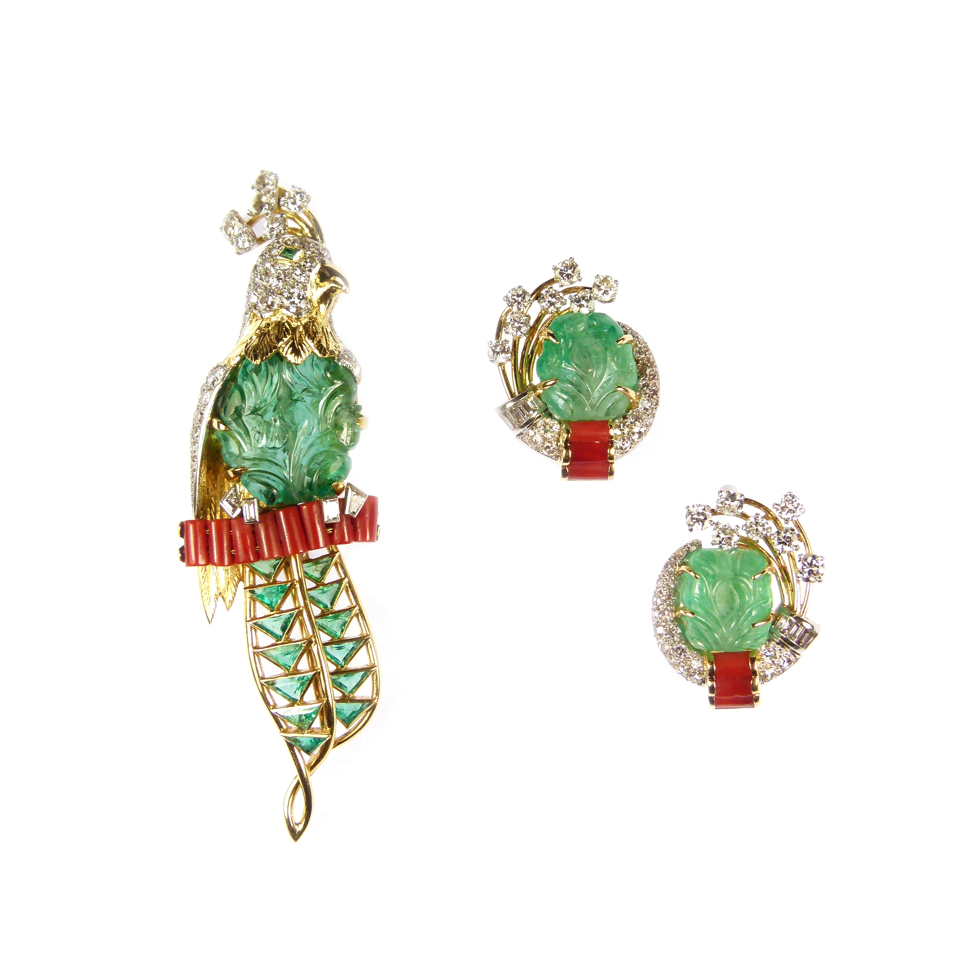 Carved emerald, diamond and corallium rubrum exotic bird brooch and earrings en suite